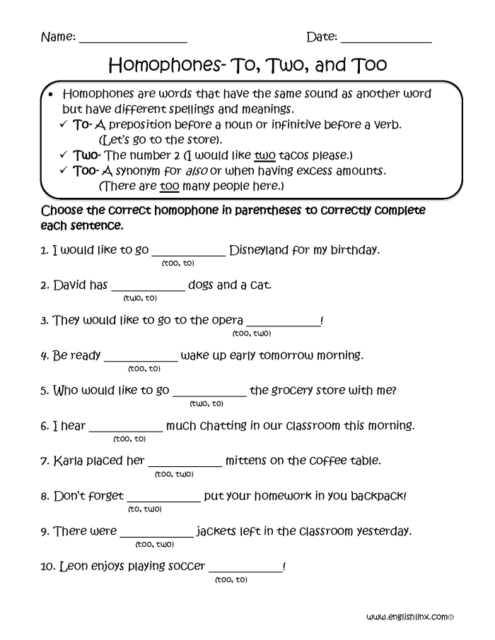 Second grade students filling out a homophones worksheet focusing on they're and their
