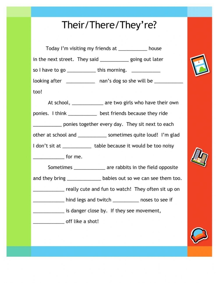 Second grade students filling out a worksheet on they're and their homophones in a life science class