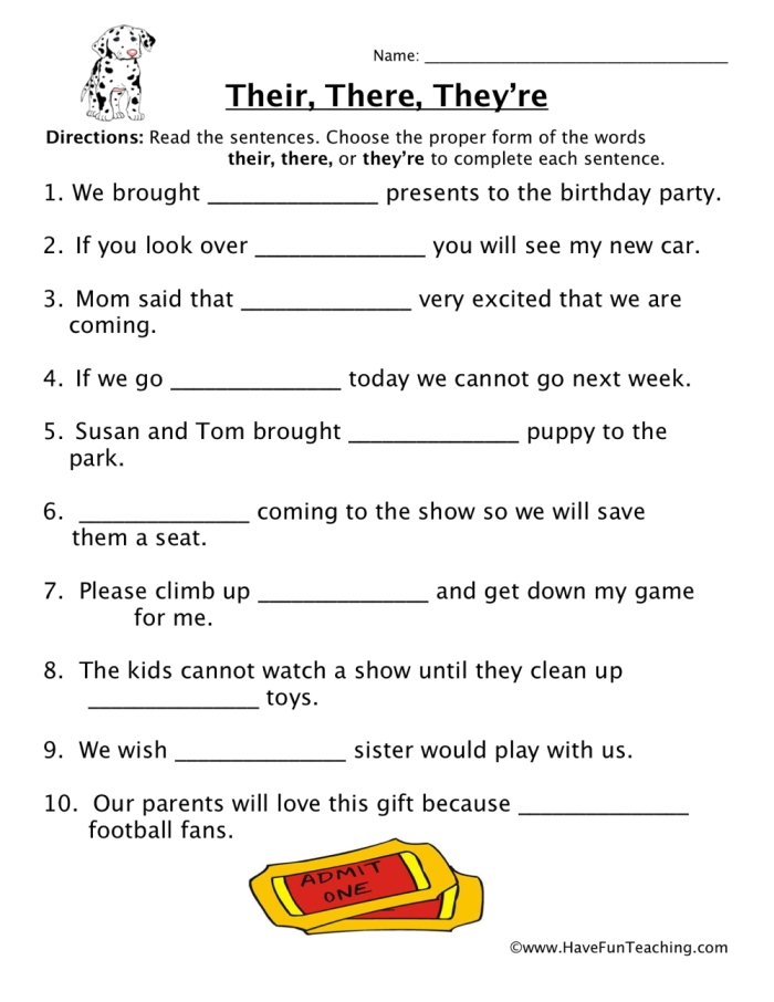 Second grade students filling out a homophones worksheet focusing on they're and their