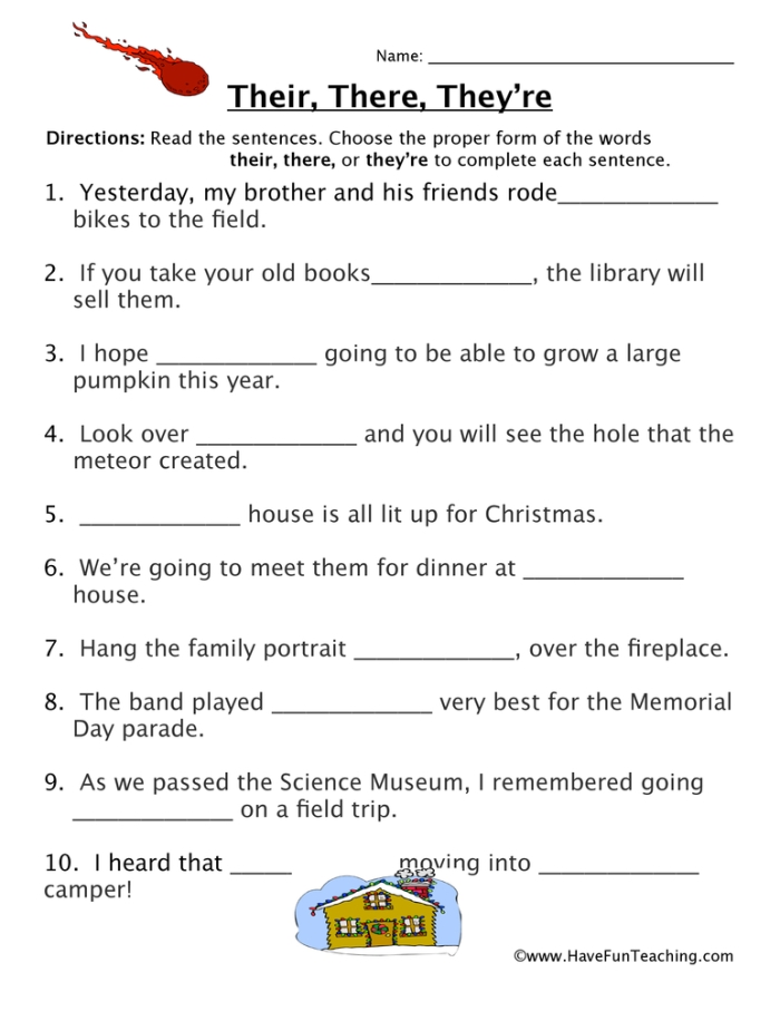 Second grade students filling out a worksheet on homophones they're and their with six sentences