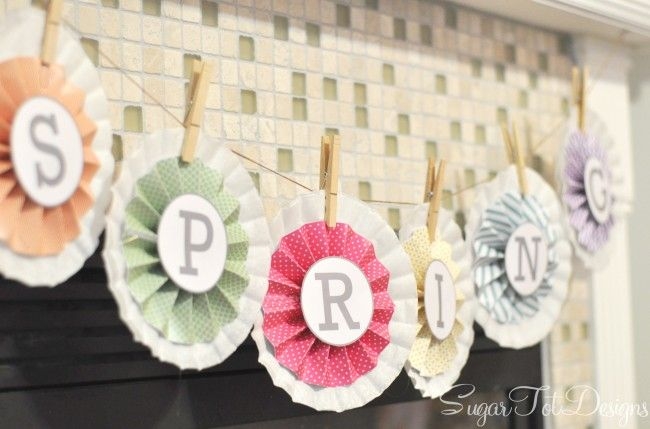 First Grade String a Spring Banner worksheet with flowers and springtime images to color and assemble