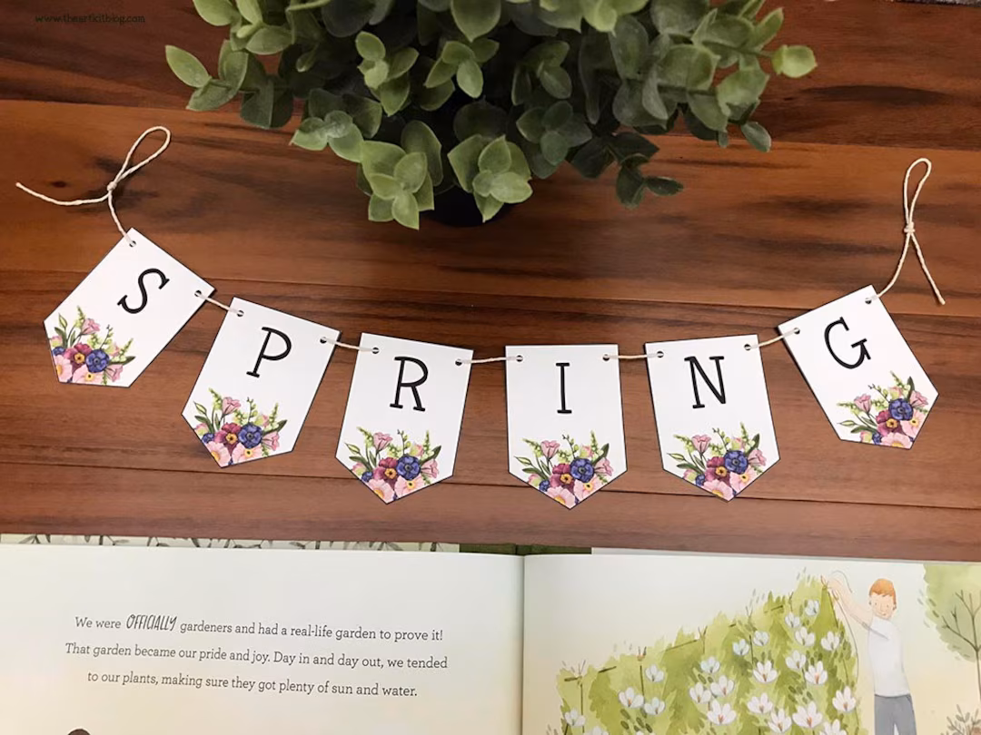 First Grade String a Spring Banner worksheet with colorful flowers and spring images to color and assemble