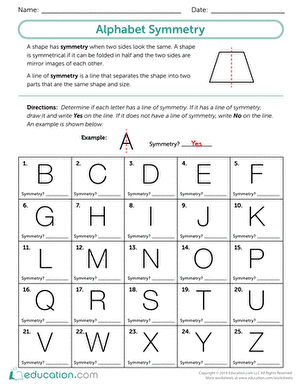 Third grade students practicing lines of symmetry on an Alphabet Symmetry worksheet
